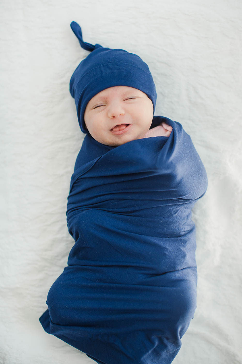 Navy blue swaddle blanket top